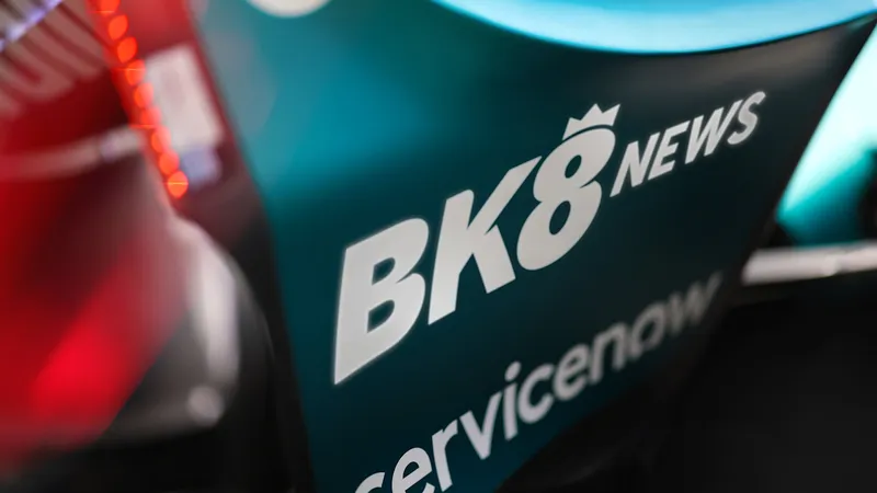 BK8 News wordmark on the Aston Martin AMR26 rear-wing endplate